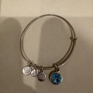 Alex and Ani Silver Bangle Bracelet with Blue Charm